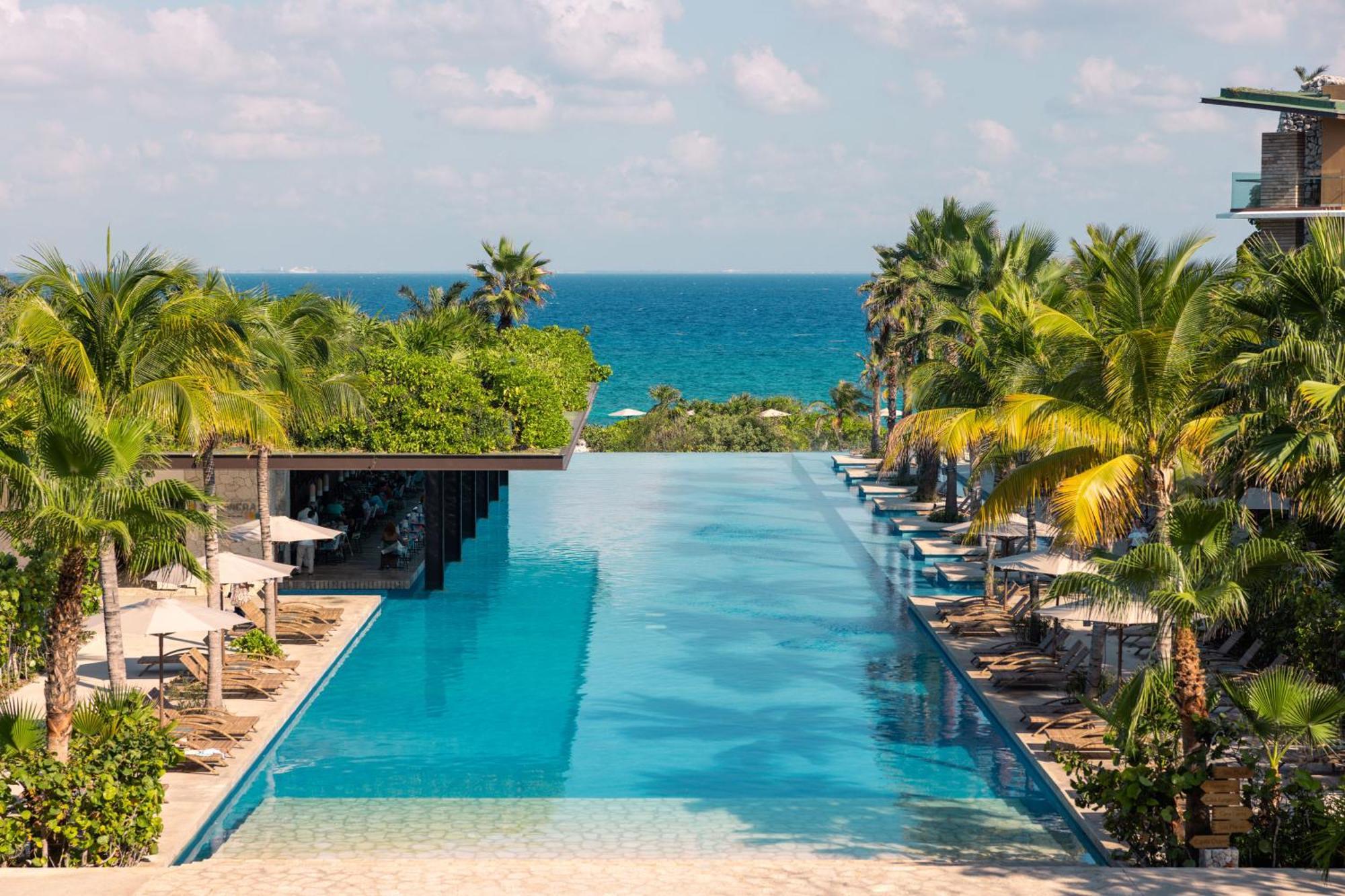 Hotel Xcaret Mexico All Parks All Fun Inclusive (Adults Only) Los Dos Compadres Exterior photo Infinity pool at the Grand Palladium Hotel, Playa del Carmen, Mexico